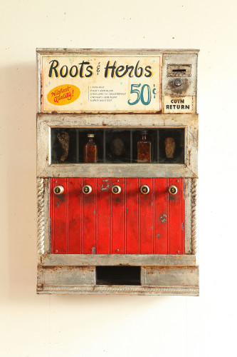 Renée Stout, The Root Dispenser, 2013; wood, paint, metal leaf, and organic materials.
