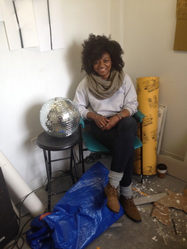 Artist Nikita Gale in her studio at the Atlanta Contemporary Art Center with a disco ball given to her by designer Gavin Bernard. Photo by Sherri Caudell.