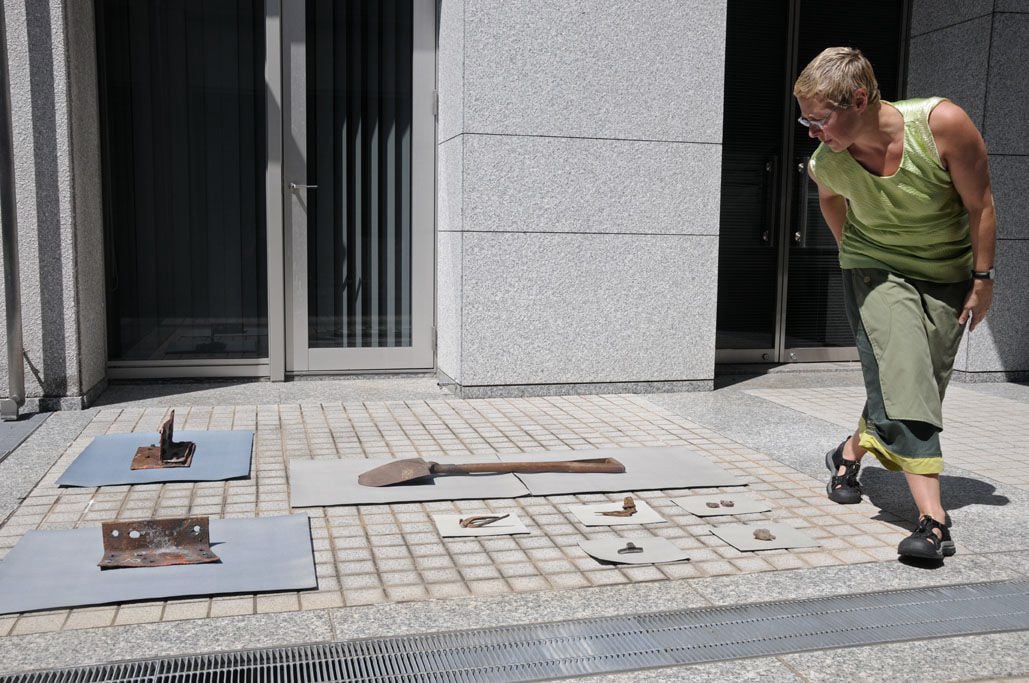 Artist preparing to make a cyanotype of A-bombed artifacts in the Hiroshima Peace Memorial Museum, Japan, 2008 (photo credit: Madeleine Marie Slavick)