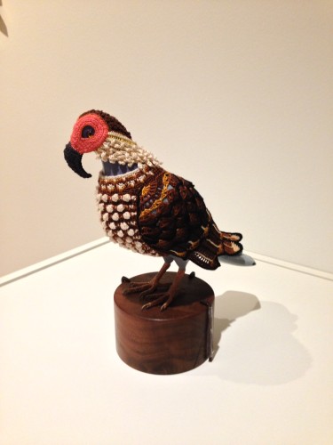 Laurel Roth Hope, Biodiversity Suits for Urban Pigeons: Guadalupe Caracara, yarn, wood, pewter, glass.