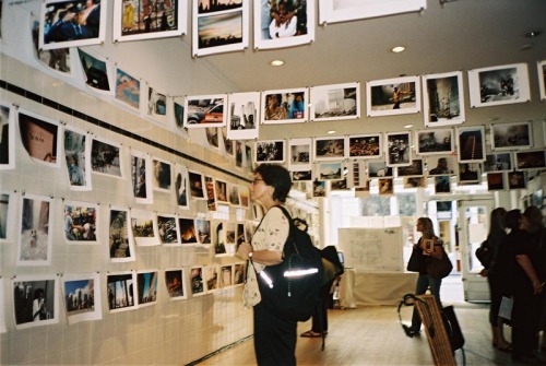 Two weeks after September 11, 2001, a SoHo storefront on Prince Street was transformed into a photography exhibition – “here is new york” – that presented images taken by professionals and amateurs alike, depicting the attack on 9/11, as well as the unstable days filled with insecurity and anguish that followed. 