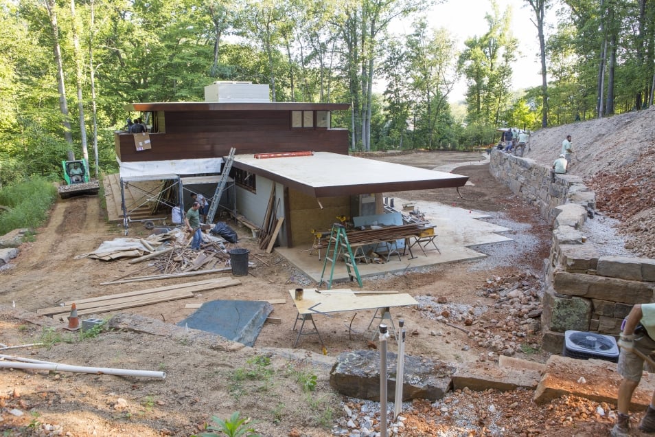 The Bachman Wilson House being reconstructed at its new site on the grounds of Crystal Bridges Museum on Friday, August 14, 2015. (Photo: Beth Hall)