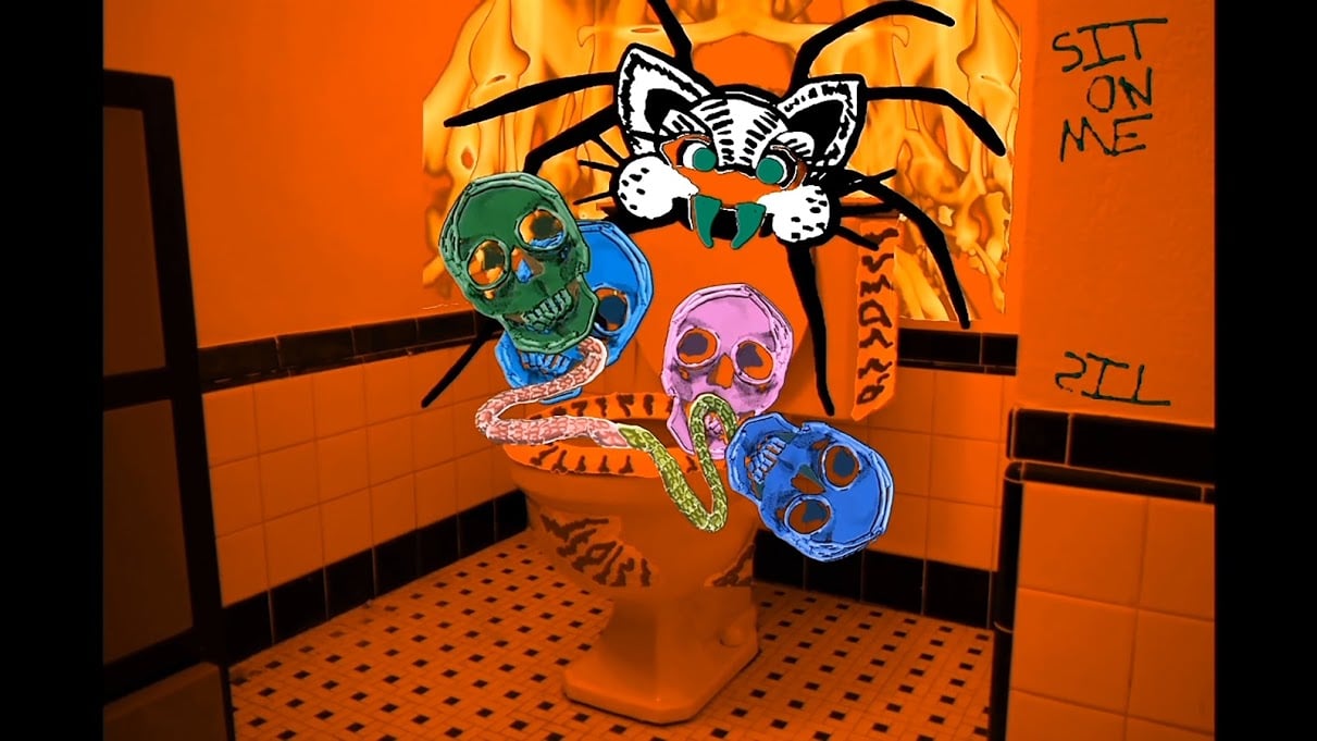 Image of a toilet in bathroom lit with orange lighting and drawn over with colorful skulls
