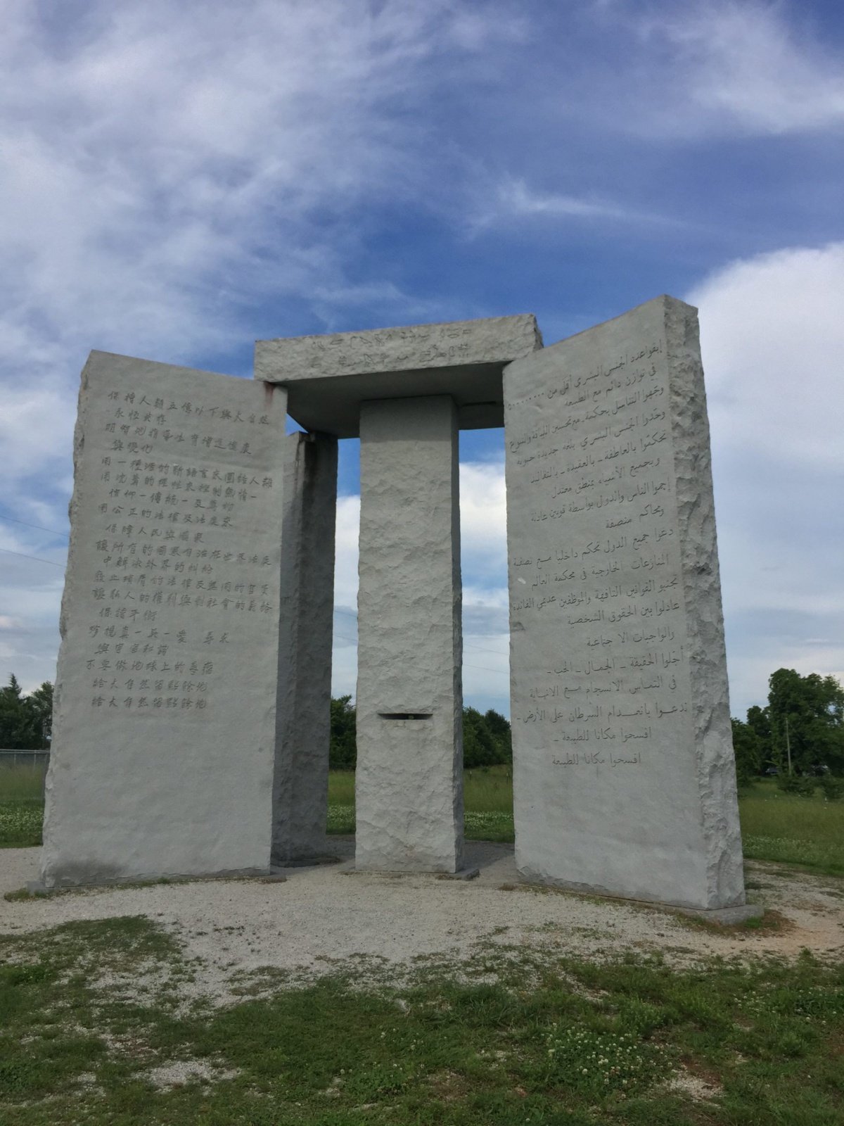 The Georgia Guidestone, an arrangement of granite monoliths with texts in various languages.