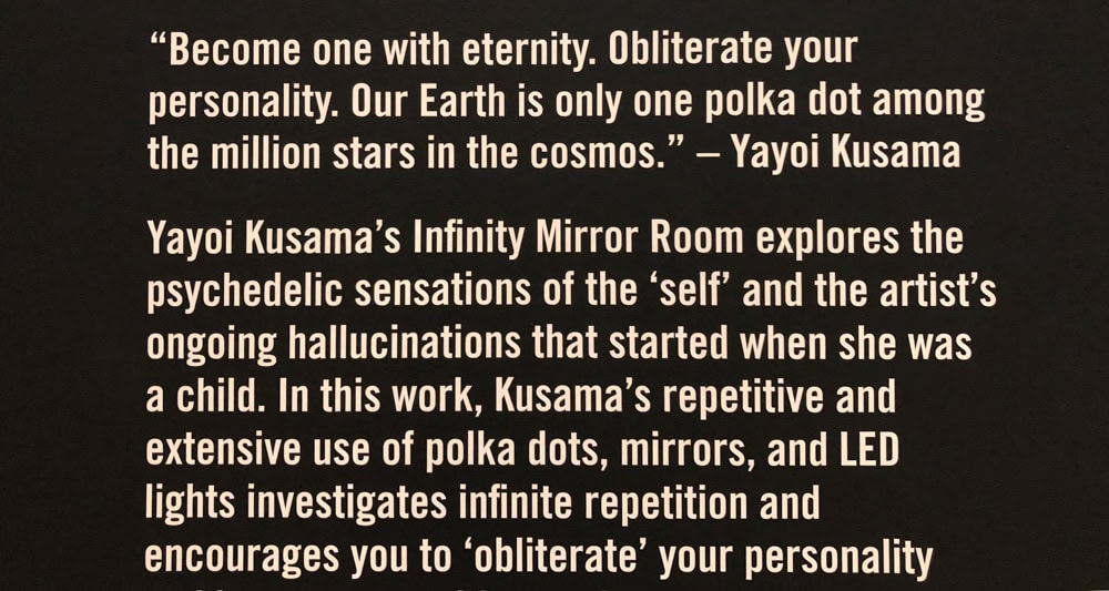 white text on a black background, with a quote from artist Yayoi Kusama.