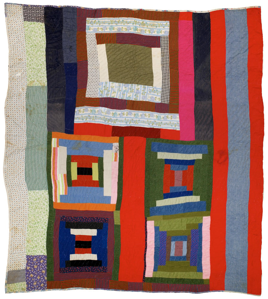 A quilt with red and neutral stripes and a large square on top with four smaller squares on the bottom, made by Lucy T. Pettway, a self-taught artist.