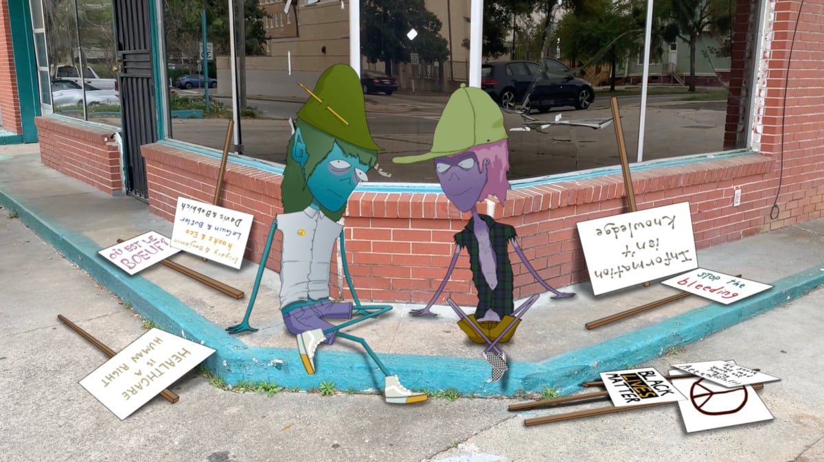 two animated humanoid figures sit at a street corner with protest signs on the ground.
