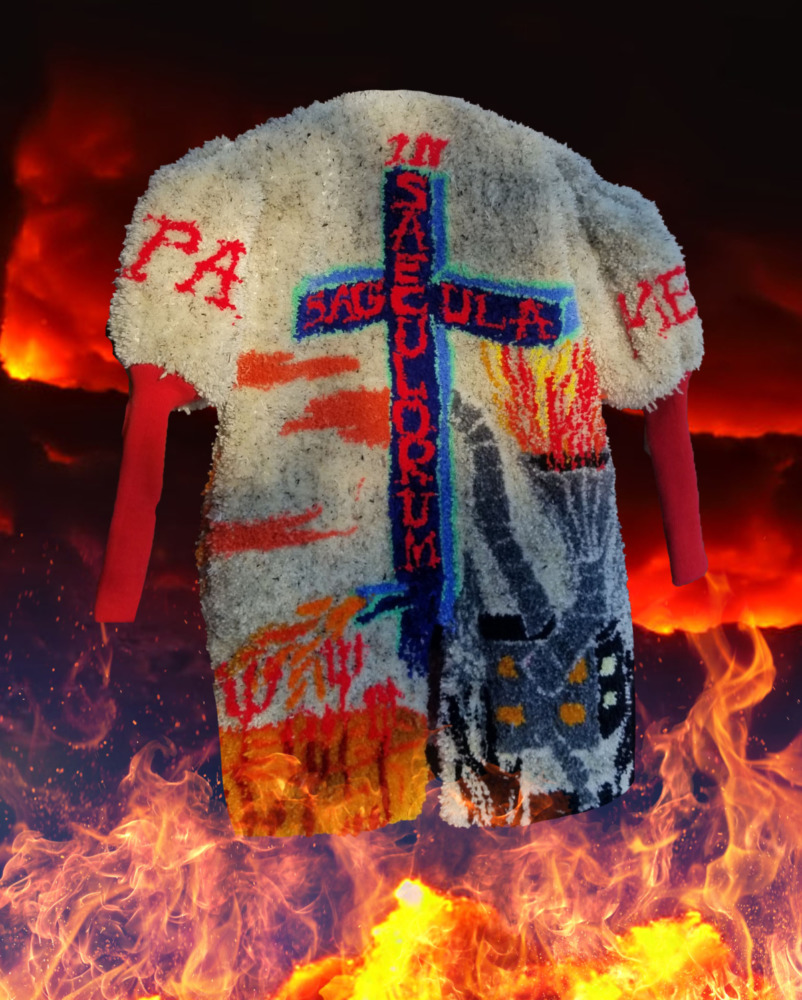 a white textured coat with red sock sleeves and red letters on the fabric, there is a cross at the center of the coat and it is on fire, in a landscape that looks like hell