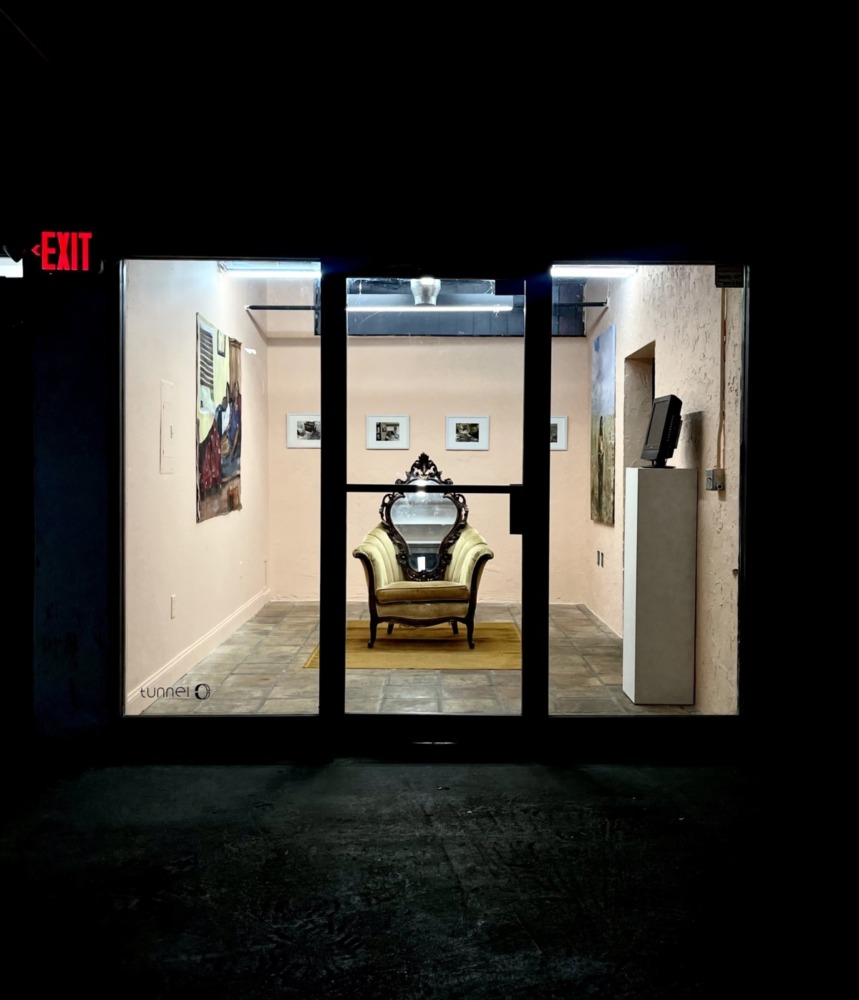 outside image of the project room lit with chair in the middle