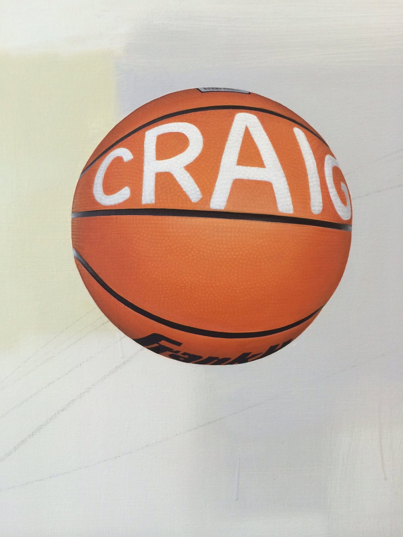 image of basketball with the name "CRAIG" written across the front